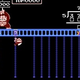 DK Jr. receives a math lesson.